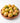 Mangoes in a wooden bowl on a white background